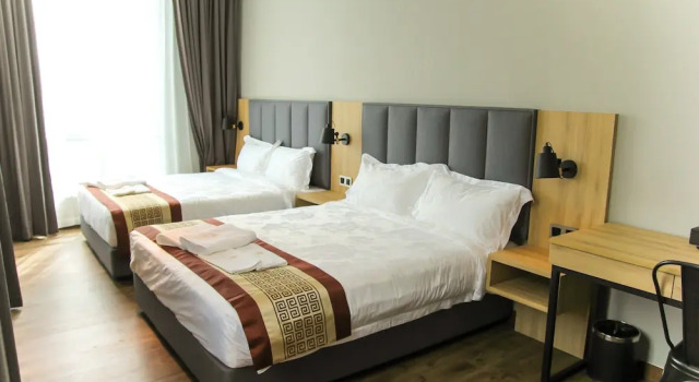 Четырёхместный номер Standard Amigo Hotel