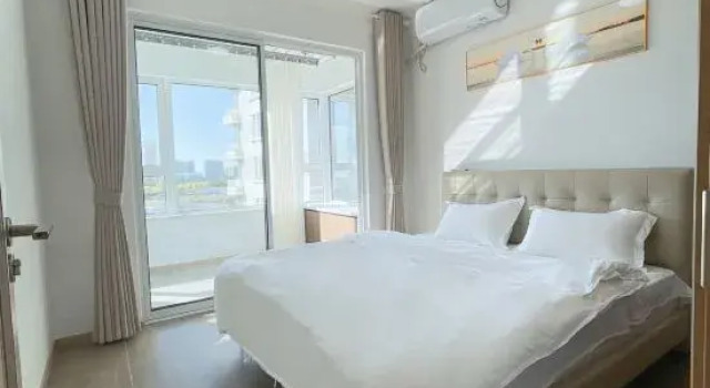 Семейный люкс с 3 комнатами Jingxi Daojia Hotel (Rongcheng Downtown Cherry Lake Sports Park)
