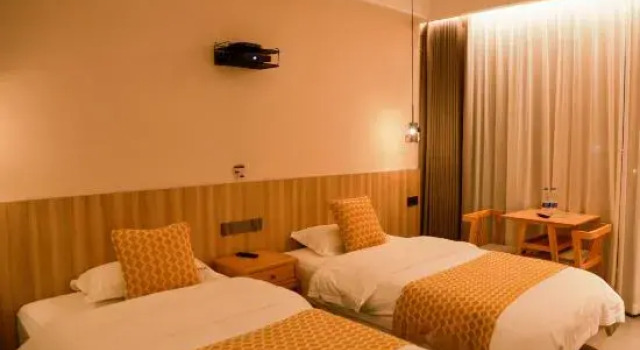 Кровать в общем номере Jiuhuashan Jiuzhou Nanyuan Homestay