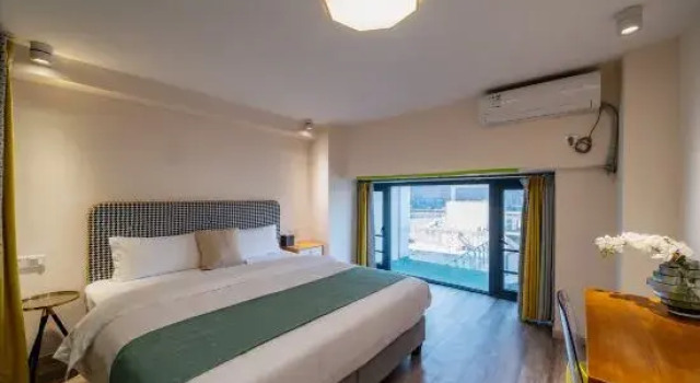 Люкс с 2 комнатами Pafei Apartment (Guangzhou Luogang Xiangxue Metro Station)