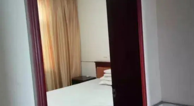 Номер Economy Yiyang Xinjia Hotel