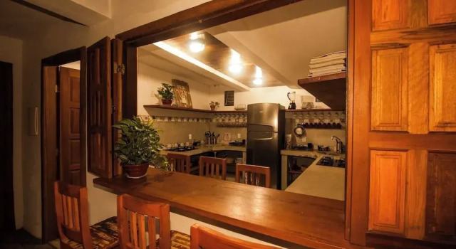 Кровать в общем номере Casa de Paixão Caraíva