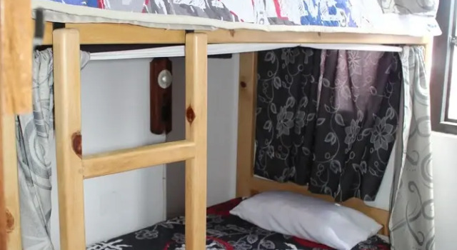 Кровать в общем номере Hostel Mirador Aukán