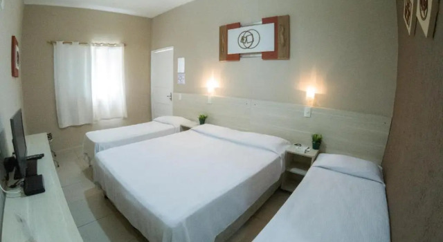 Четырёхместный номер Standard Hotel Rio Guarujá - "Sua casa na praia"