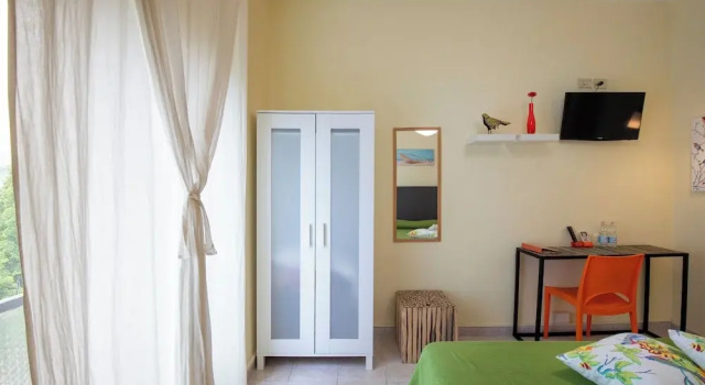 Четырёхместный семейный номер Standard с красивым видом из окна Albergo Villa Gaia
