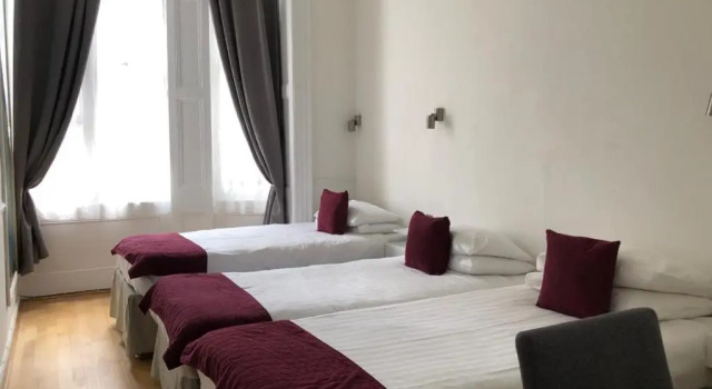 Трёхместный номер Rushmore Hotel