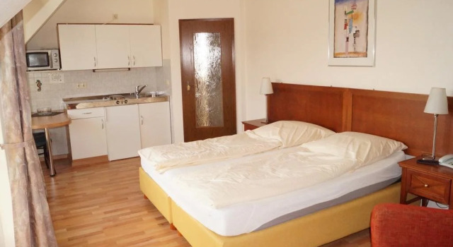 Pension Appartementhaus Hus Möhlenbarg, Забронировать Отель Пляж Куксхавен Куксхафен