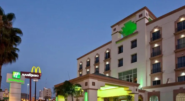 Кровать в общем номере Holiday Inn Leon - Poliforum by IHG