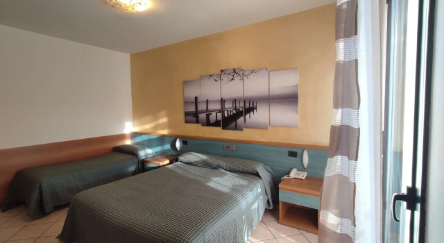 Трёхместный номер Standard с балконом Albergo Al Cacciatore