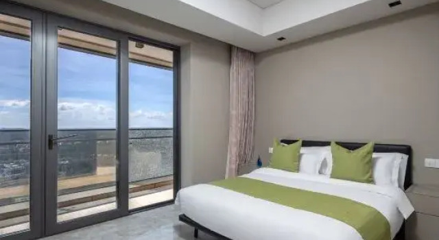 Люкс с 3 комнатами с видом на море Boao Haitian Mingyuan Seaview Apartment