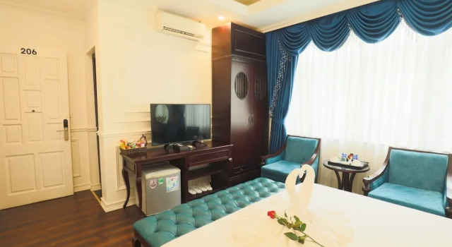 Номер Deluxe Hoàng Gia Xa La Boutique Hotel