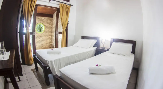 Четырёхместный номер Deluxe с видом на сад Villa del Mar Praia Hotel