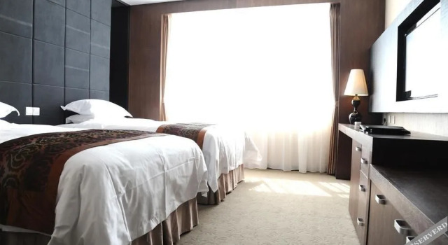 Kaiqi Boutique Hotel, Rezerwuj Boutique Hotel Hotele 4-gwiazdkowe w Jilin, 4*
