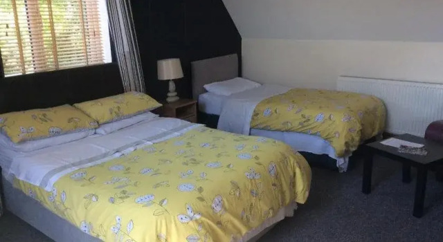 Coach House Suites