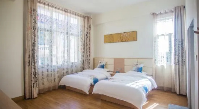 Люкс с 4 комнатами с балконом и с красивым видом из окна Meizhou Island Liyuan Shudao Homestay