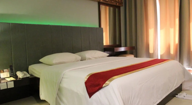 Номер Deluxe Sutan Raja Hotel & Convention Centre Kotamobagu