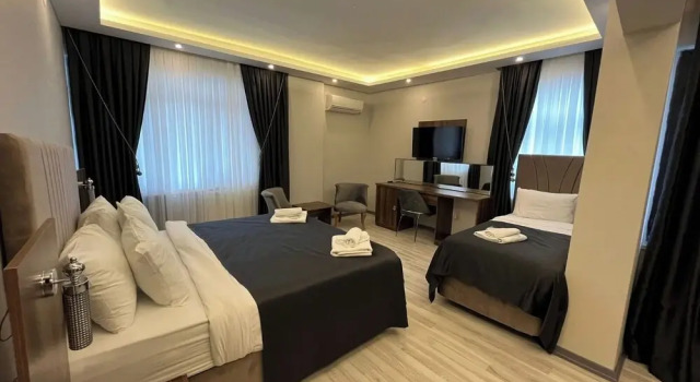 Четырёхместный номер Standard Grand Krone Hotel