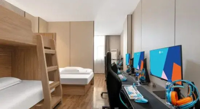 Кровать в общем номере i Electronic Sports Hotel (Jiangyin Zhongshan Park)