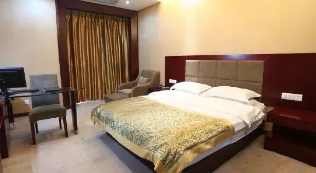 Люкс Deluxe c 1 комнатой Qingliu Jiuzhou Business Hotel