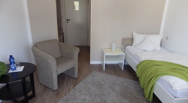 Одноместный номер Economy с балконом и с видом на сад Pension Haus Heitzig