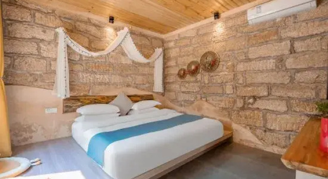 Кровать в общем номере Weizhou Island Coral Residence Homestay (Catholic Church Beike Beach)