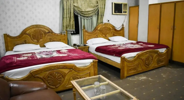 Standard quadruple chambre New Capital Hotel
