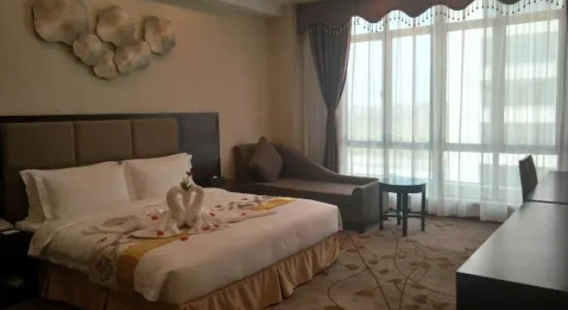 Люкс Business Sumahui Hotel (Suzhou East Railway Station Kechuang Center)