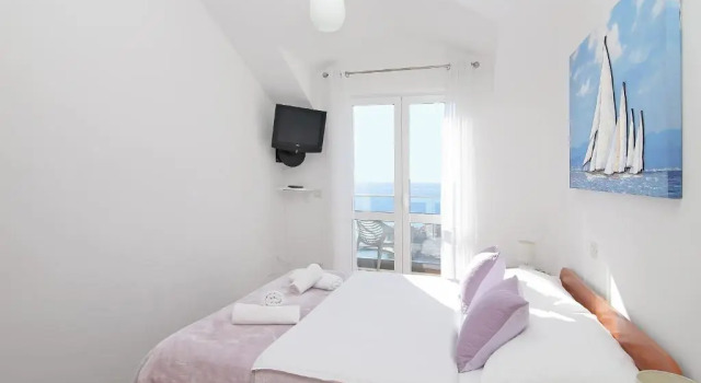 Апартаменты Comfort с 3 комнатами с балконом и с видом на море Apartments Isabora