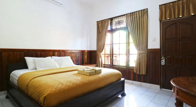 Номер Deluxe Puri Nusa Beach Hotel