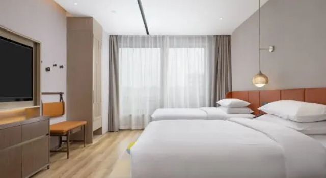 Deluxe Neljän hengen Sviitti Jiyi Hotel (Yining Beijing Road Branch)
