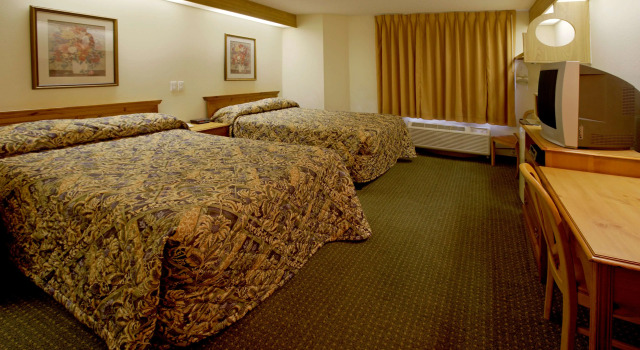 Четырёхместный номер Standard Americas Best Value Inn Addison