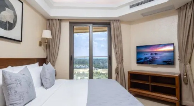 Suite 1 sypialnia z widokiem na ogród Zhenru Hotel