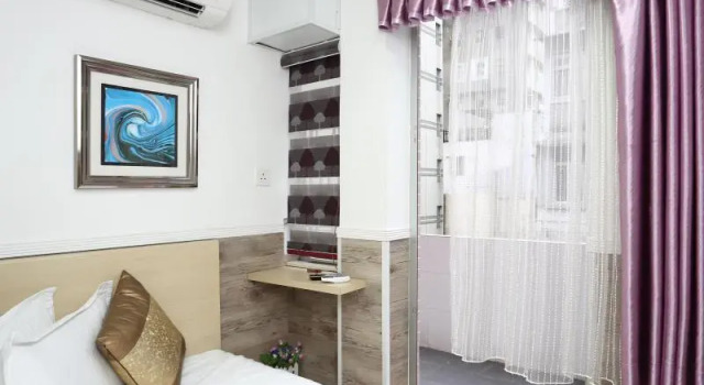 Кровать в общем номере Super Guest House