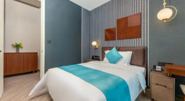 Семейный люкс с 3 комнатами Dongguan Shan Zhi Ye Serviced Apartment Hotel - Houjie Wanda Plaza Liaoxia Subway Station