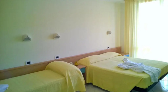 Четырёхместный номер Standard Hotel Paola Garden