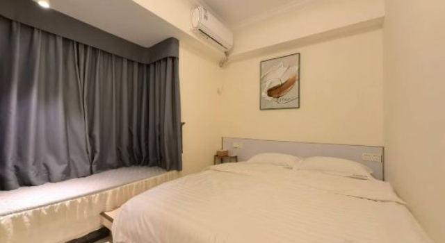 Люкс Deluxe Dongguan Shiguang Apartment (Guomao Huiyi City)