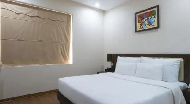 Кровать в общем номере Luxury6 Hotel