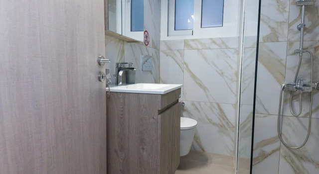 Апартаменты Stylish Brand New Apt at Megaro Mousikis