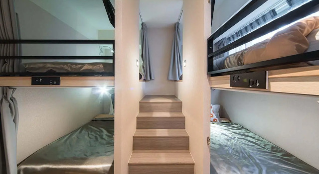 Кровать в общем номере (женский номер) Huada Hotel