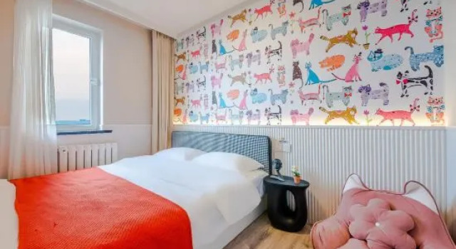 Трёхместный семейный люкс с 2 комнатами с балконом и с видом на море Miomi Homestay