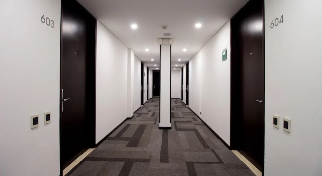 Четырёхместный семейный номер Standard Hotel Madisson Inn Luxury By GEH Suites