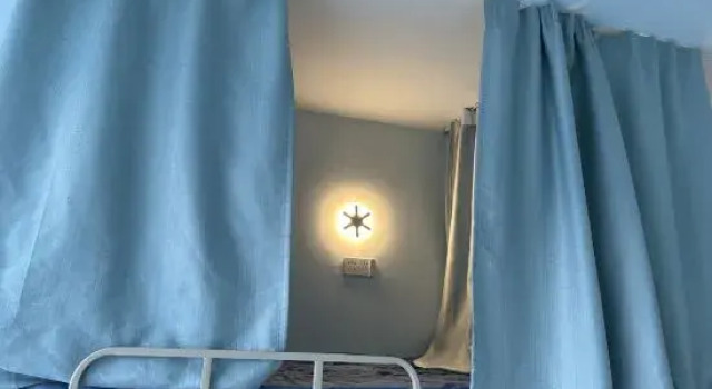 Кровать в общем номере Dali Kanhai Hostel