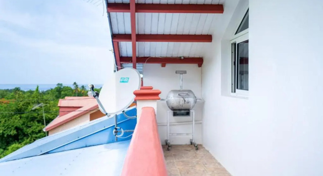 Maison de 2 chambres avec vue sur la mer terrasse amenagee et wifi a Vieux Habitants a 1 km de la plage, Rezerwuj Hotel Bouillante Basse-Terre