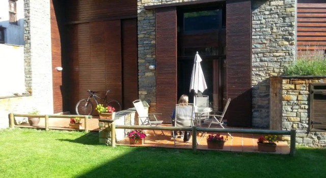 Апартаменты Apartamento duplex de 90m2 con salida a jardín