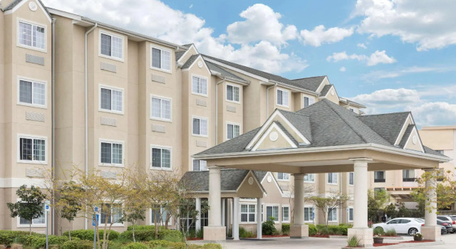 Кровать в общем номере Microtel Inn and Suites Baton Rouge Airport