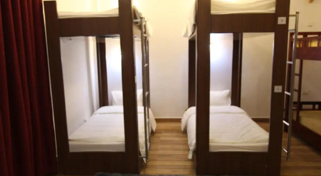 Кровать в общем номере Himalaya Sapa Hotel