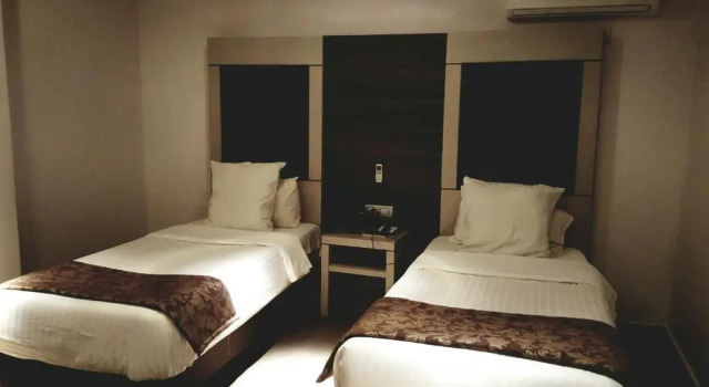 Superior Vierer Zimmer Grand Hotel Central Conakry