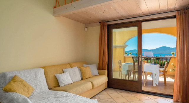 Apartment with a sea view, has 2 bedrooms: one double with en-suite bathroom and one triple with a F-CALA MORESCA, Book Lejlighed Golfo Aranci Emerald Coast