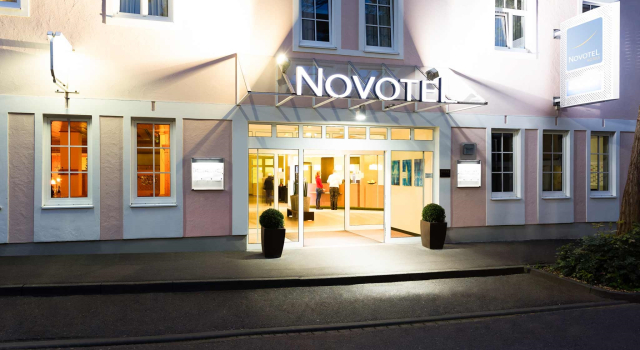 Кровать в общем номере Dorint Hotel Würzburg