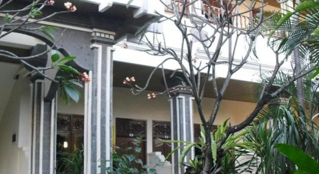 Кровать в общем номере Adus Beach Inn